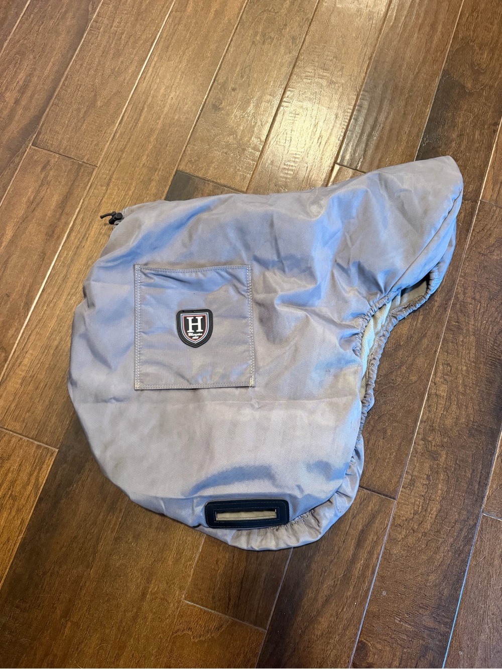 Grey fleece saddle cover used, H champion
